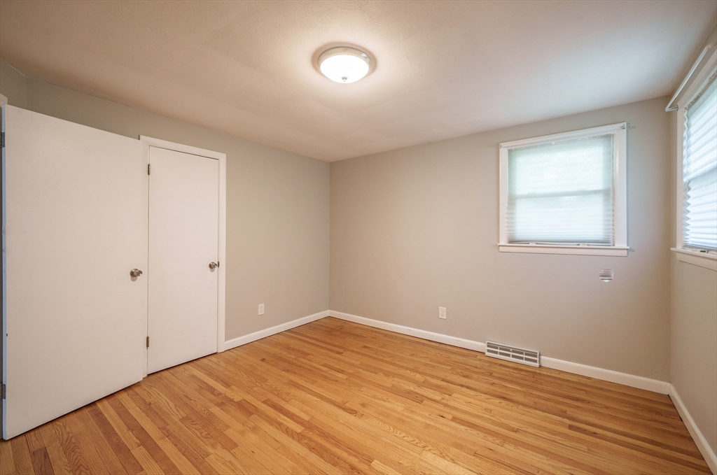 226 Dutchess Street Springfield, MA 01129 - Photo 25 of 39 a view of empty room with wooden floor