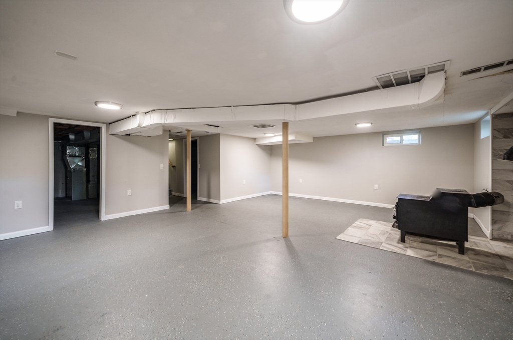 226 Dutchess Street Springfield, MA 01129 - Photo 29 of 39 an empty room with wooden floor and windows