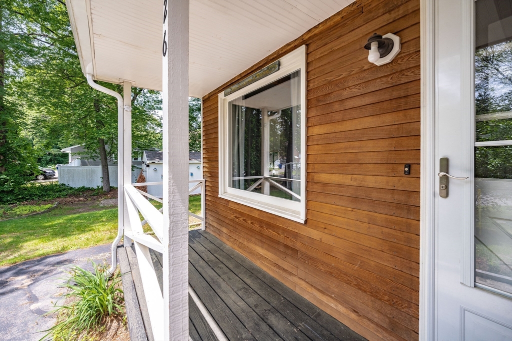 226 Dutchess Street Springfield, MA 01129 - Photo 3 of 39 a front view of a house with a yard