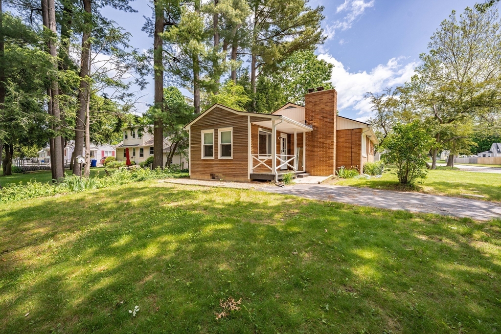 226 Dutchess Street Springfield, MA 01129 - Photo 34 of 39 a front view of a house with a yard