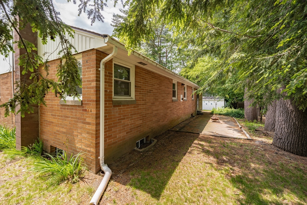 226 Dutchess Street Springfield, MA 01129 - Photo 37 of 39 a view of a yard with wooden fence