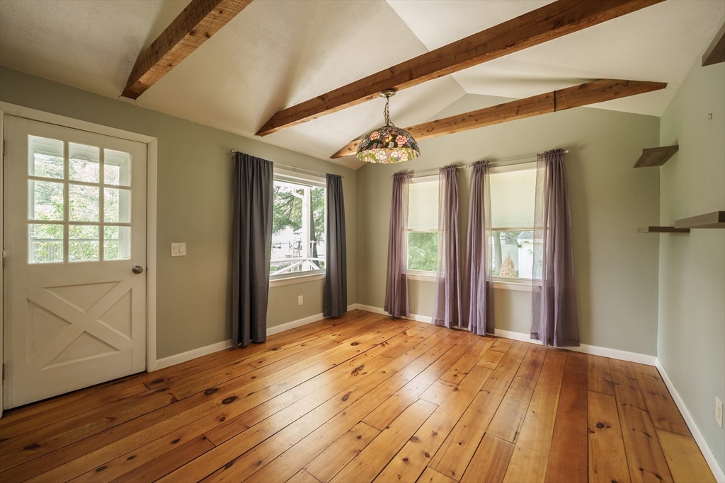 226 Dutchess Street Springfield, MA 01129 - Photo 6 of 39 a view of a room with wooden floor and staircase
