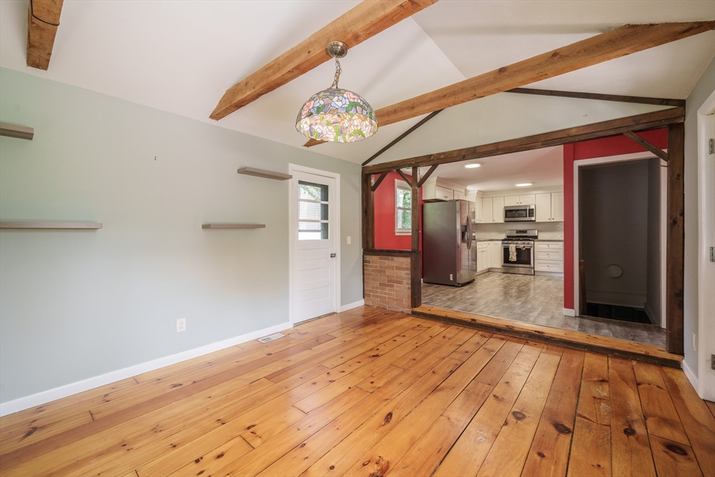 226 Dutchess Street Springfield, MA 01129 - Photo 8 of 39 a view of a hallway with wooden floor