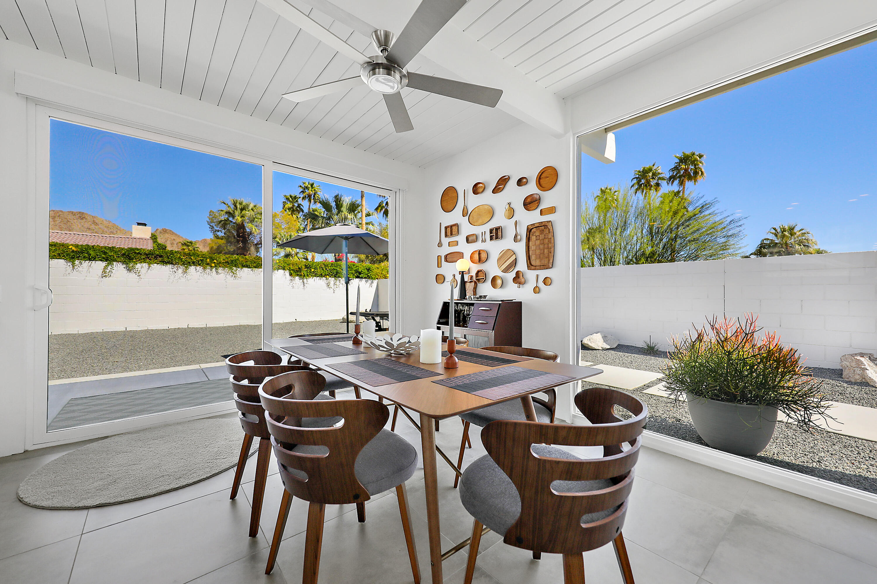 71350 Halgar Road Rancho Mirage, CA 92270 - Photo 14 of 33 a view of a dining room with furniture window and flowerpot