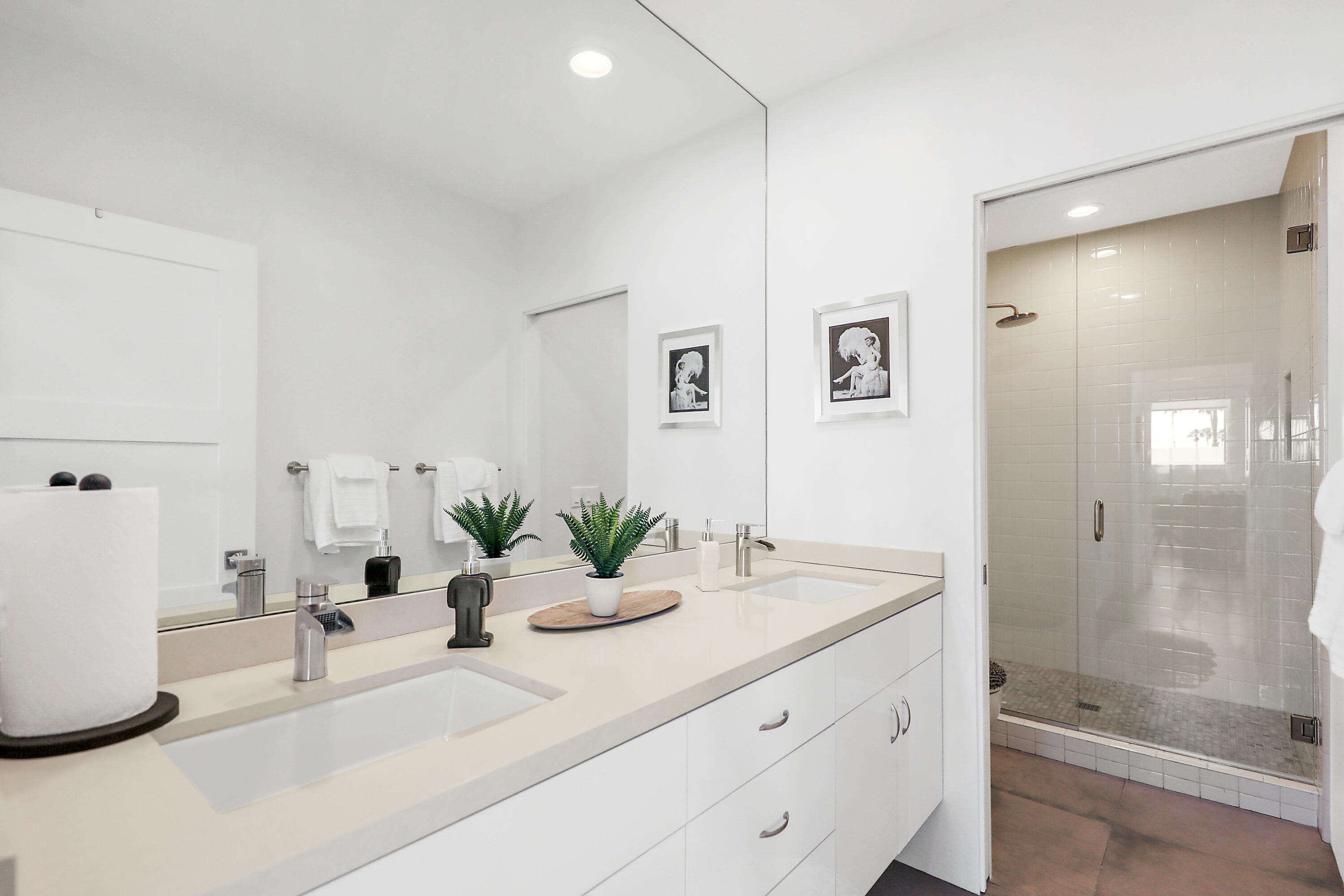 71350 Halgar Road Rancho Mirage, CA 92270 - Photo 16 of 33 a bathroom with a double vanity sink mirror and shower