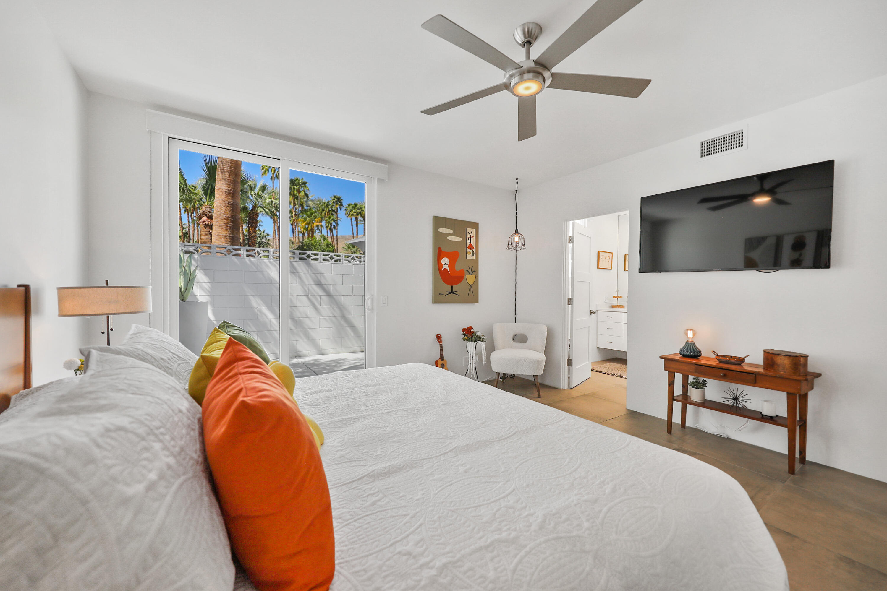 71350 Halgar Road Rancho Mirage, CA 92270 - Photo 21 of 33 a bedroom with a bed and a flat screen tv