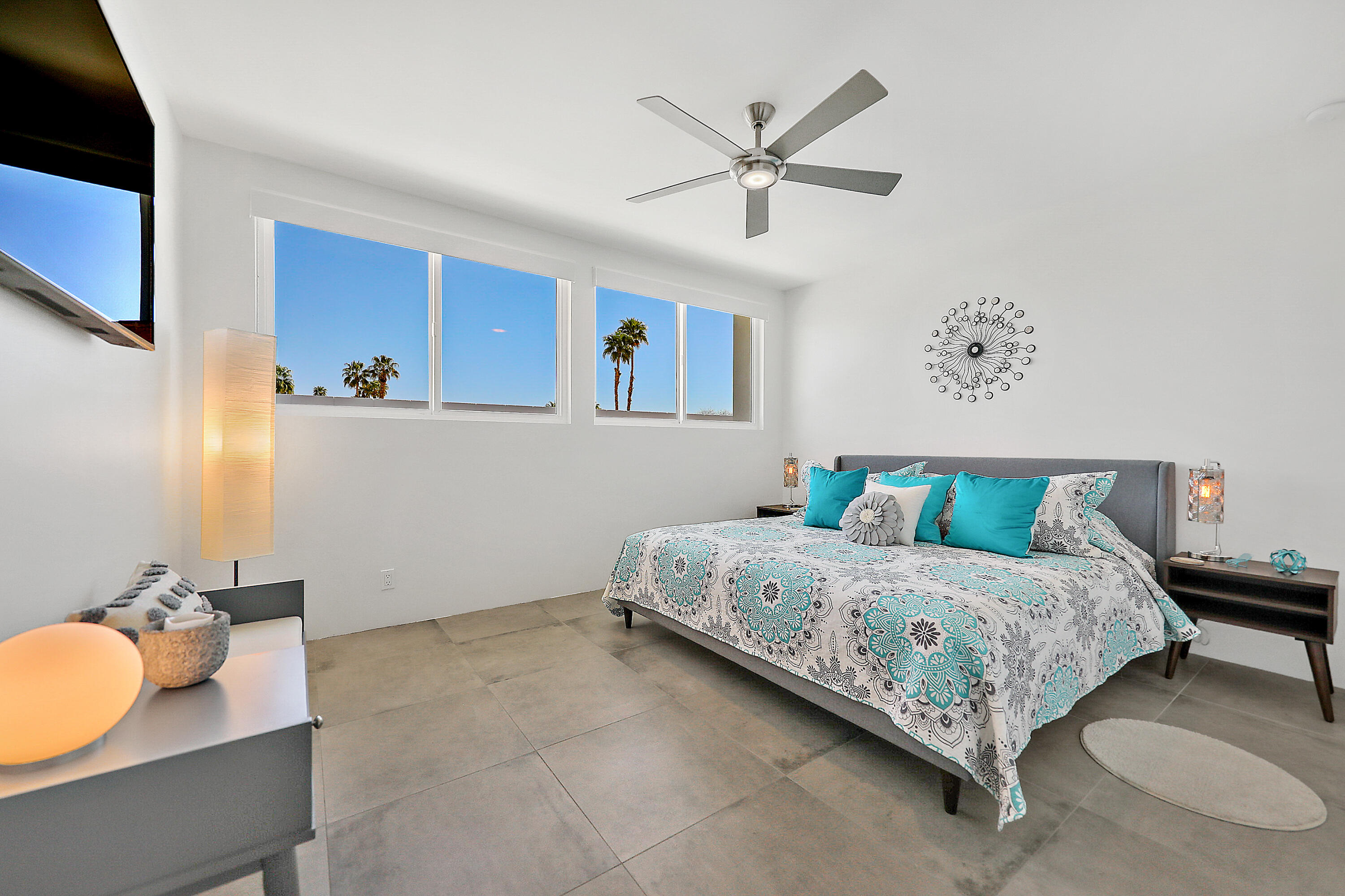 71350 Halgar Road Rancho Mirage, CA 92270 - Photo 23 of 33 a bedroom with a bed and couch