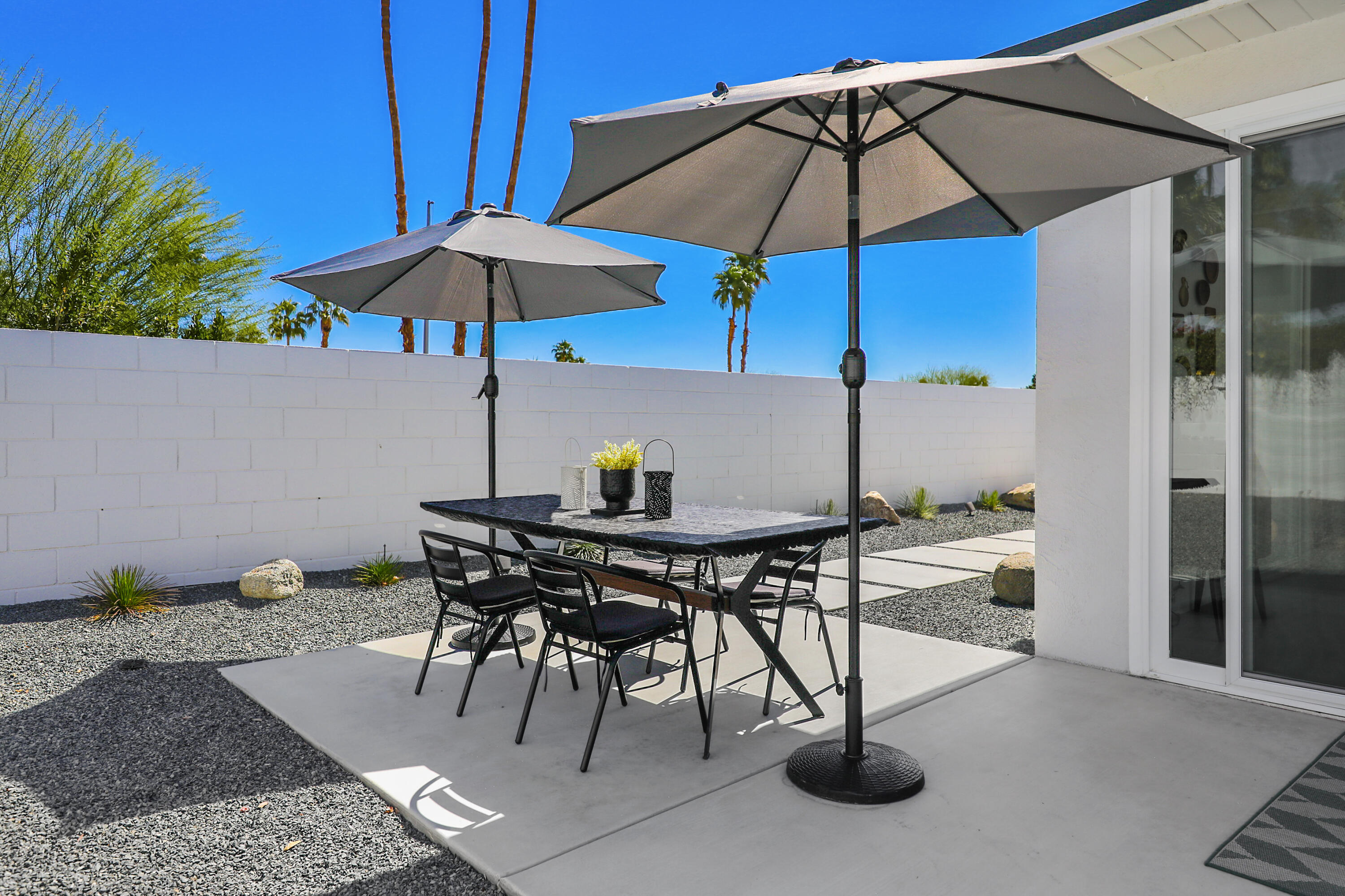 71350 Halgar Road Rancho Mirage, CA 92270 - Photo 24 of 33 a view of chairs and tables in the patio