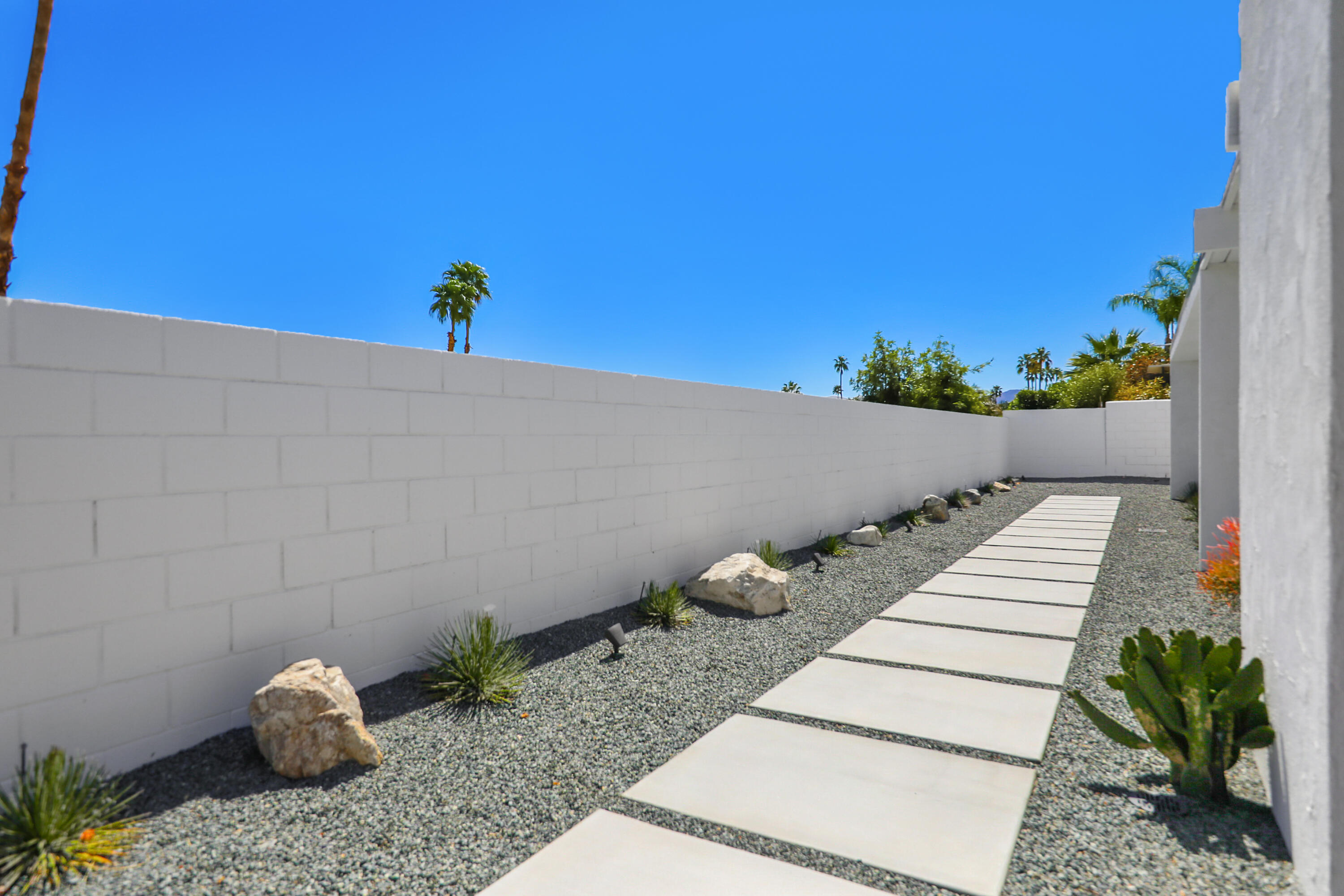 71350 Halgar Road Rancho Mirage, CA 92270 - Photo 25 of 33 a view of path along with wooden fence