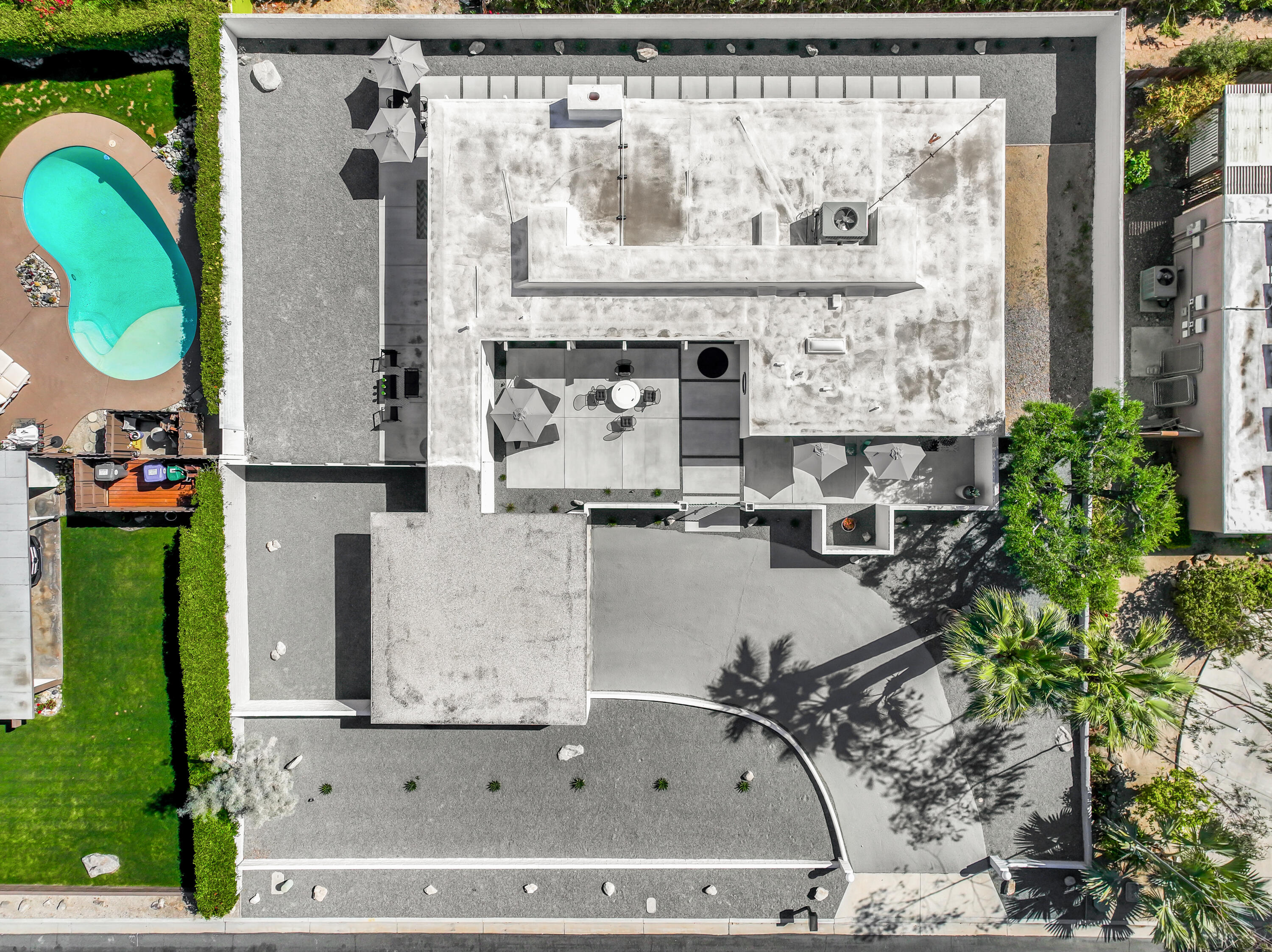 71350 Halgar Road Rancho Mirage, CA 92270 - Photo 30 of 33 an aerial view of a house with a swimming pool
