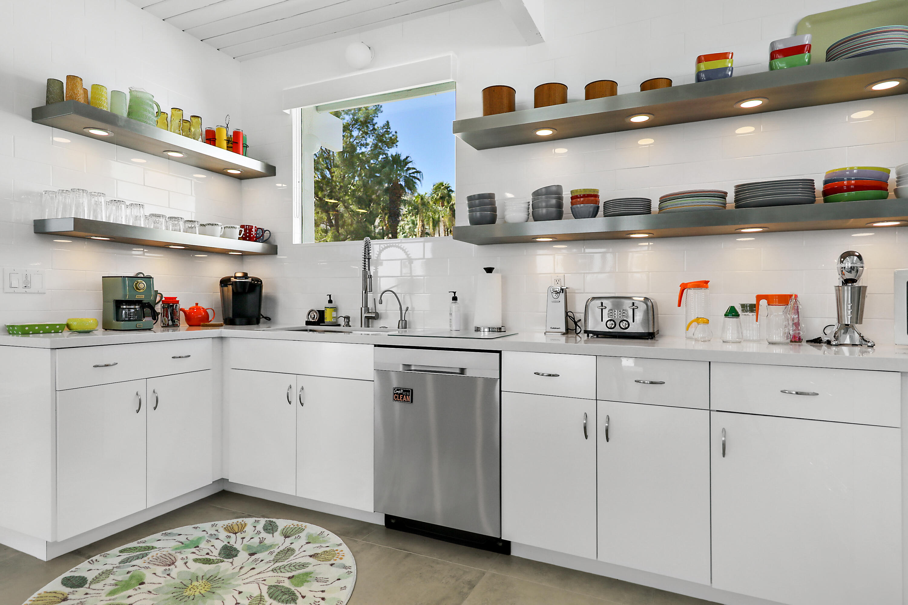 71350 Halgar Road Rancho Mirage, CA 92270 - Photo 5 of 33 a kitchen with cabinets and wooden floor