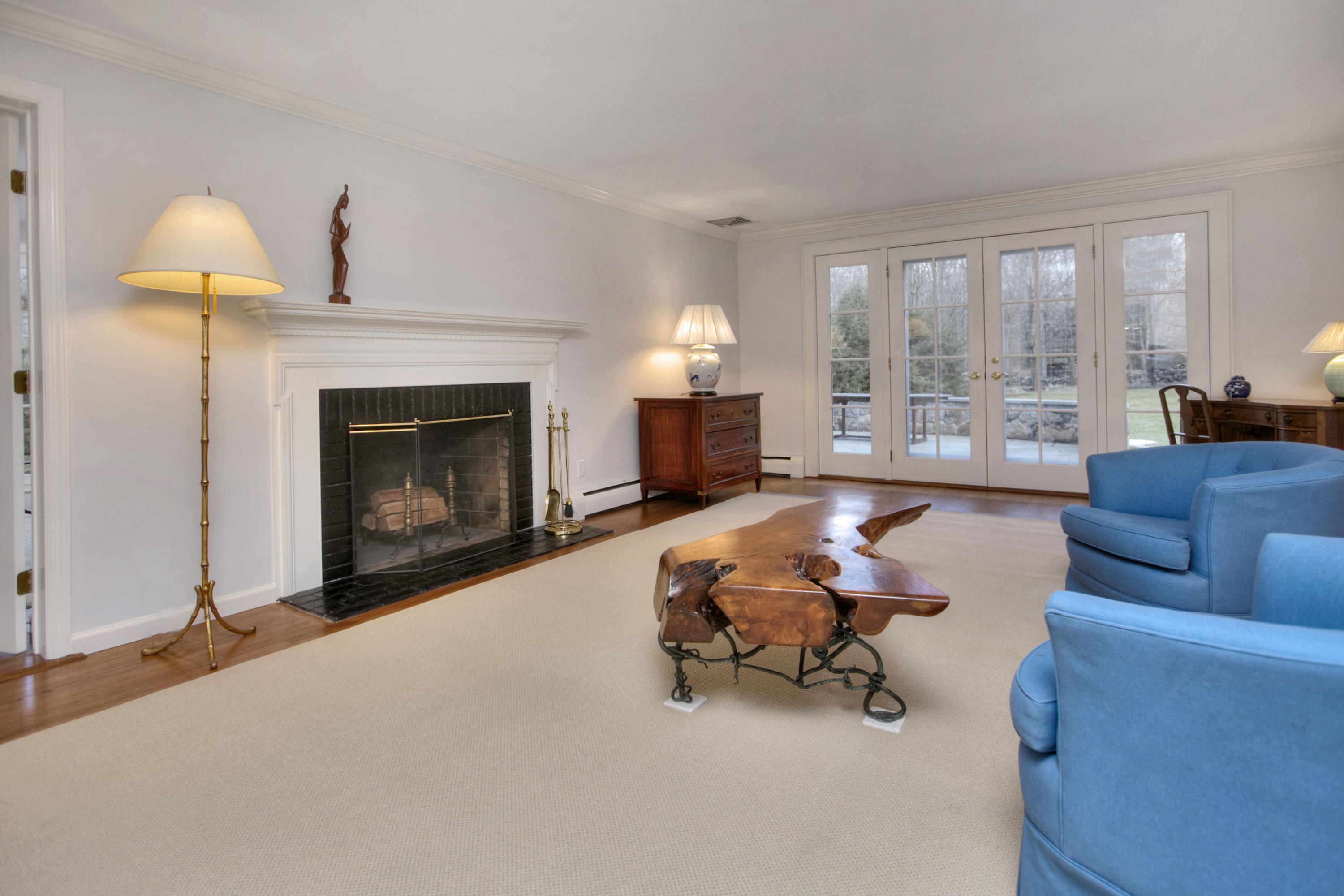 736 Silvermine Road New Canaan, CT 06840 - Photo 9 of 30 a living room with furniture and a fireplace