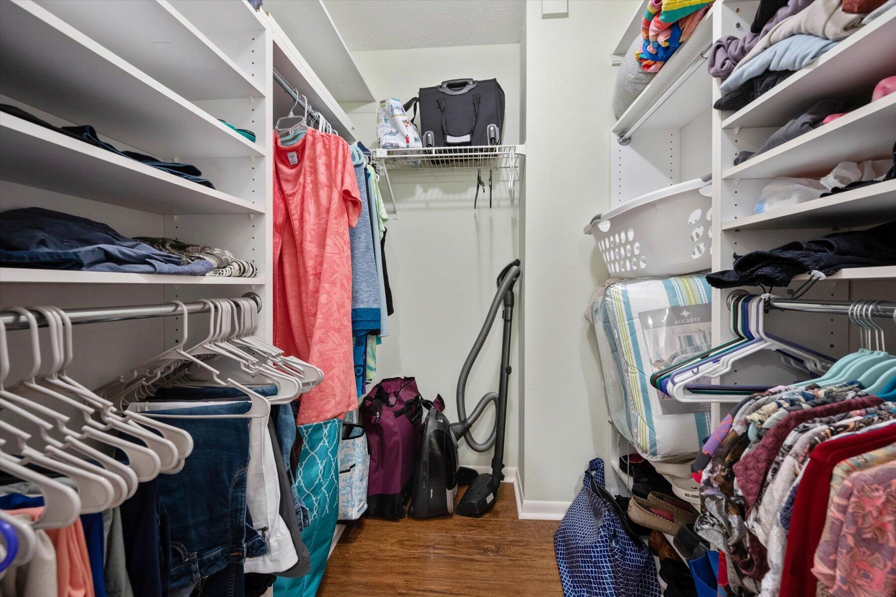 130 Palm Avenue, Unit 20 Jupiter, FL 33477 - Photo 36 of 51 a view of walk in closet with clothes and shoes