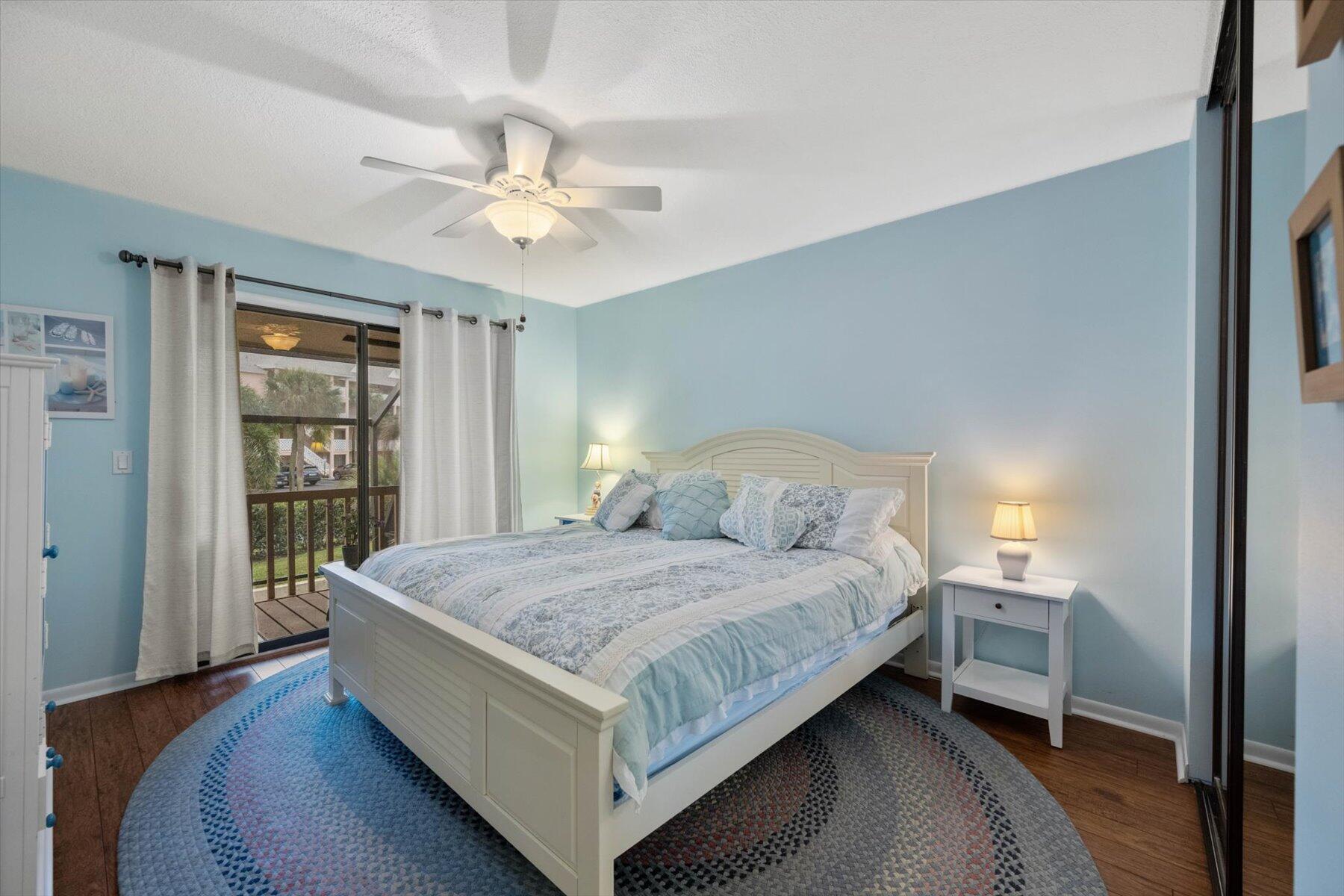 130 Palm Avenue, Unit 20 Jupiter, FL 33477 - Photo 37 of 51 a bedroom with a bed and window