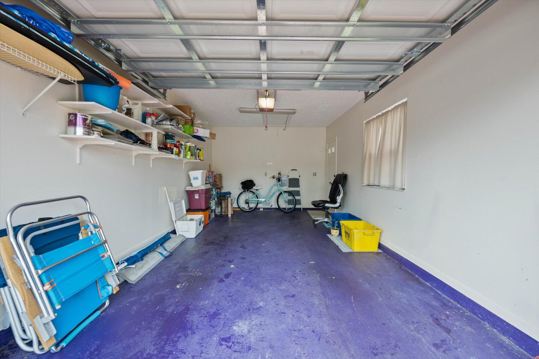 130 Palm Avenue, Unit 20 Jupiter, FL 33477 - Photo 43 of 51 a view of a room with gym equipment