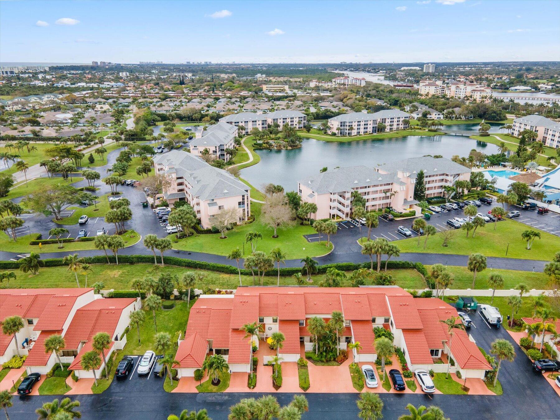 130 Palm Avenue, Unit 20 Jupiter, FL 33477 - Photo 46 of 51 an aerial view of residential houses with outdoor space and river