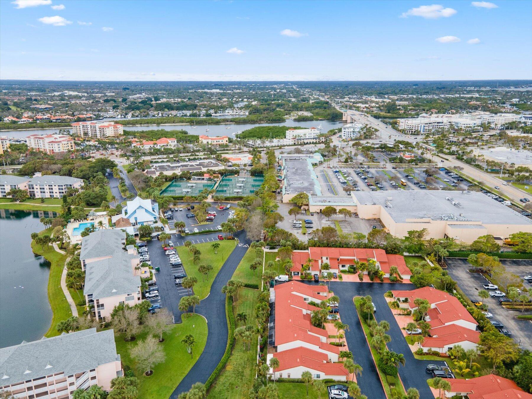 130 Palm Avenue, Unit 20 Jupiter, FL 33477 - Photo 50 of 51 an aerial view of residential houses with outdoor space