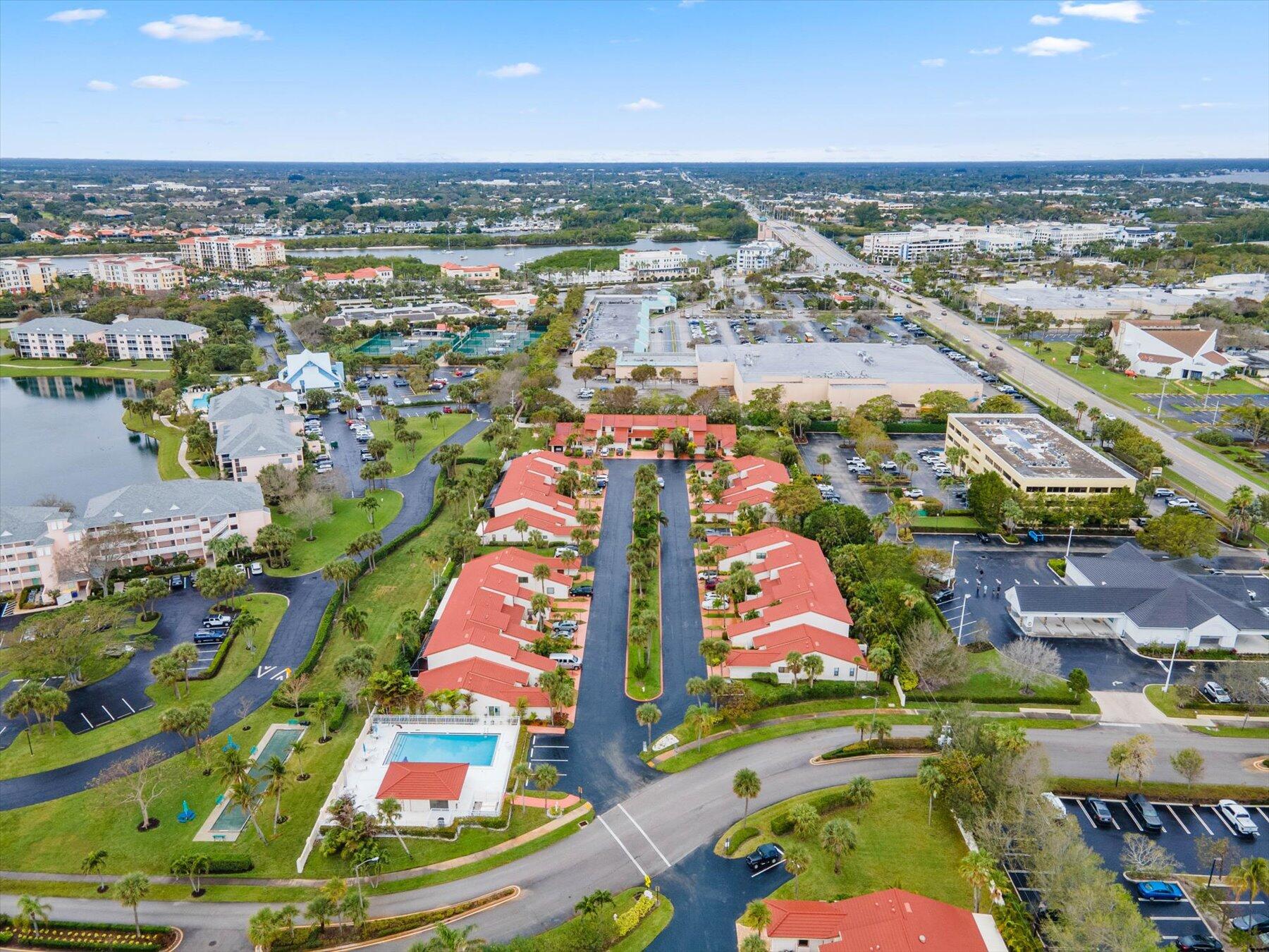 130 Palm Avenue, Unit 20 Jupiter, FL 33477 - Photo 51 of 51 an aerial view of residential houses with outdoor space