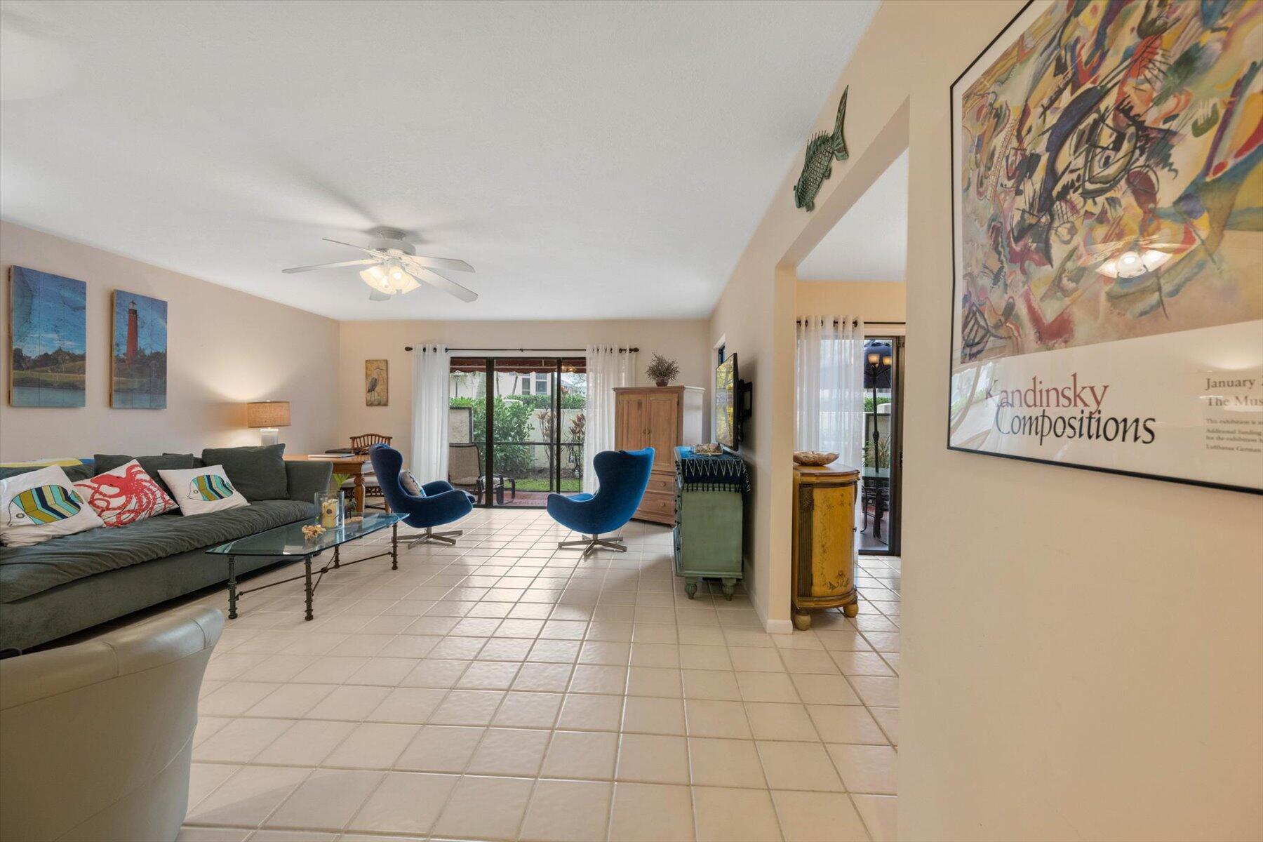 130 Palm Avenue, Unit 20 Jupiter, FL 33477 - Photo 7 of 51 a living room with furniture and a couch