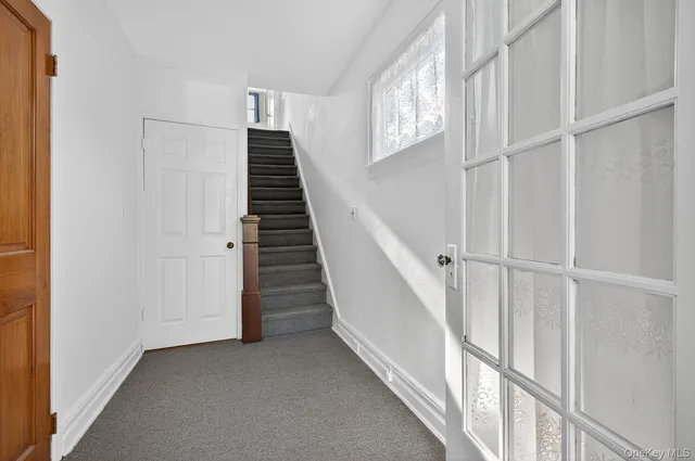 a view of hallway with stairs