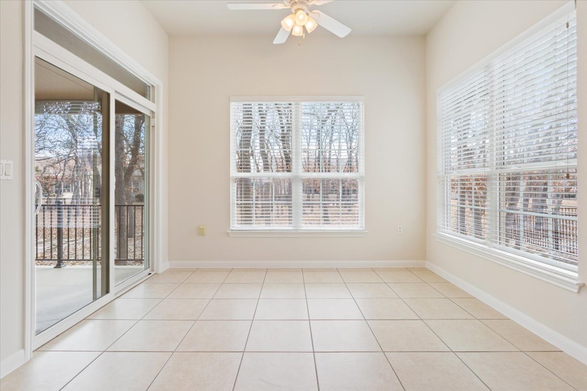 308 Monarch Trail Georgetown, TX 78633 - Photo 19 of 39 The bright sunroom is located off of the living room and has access to the patio.