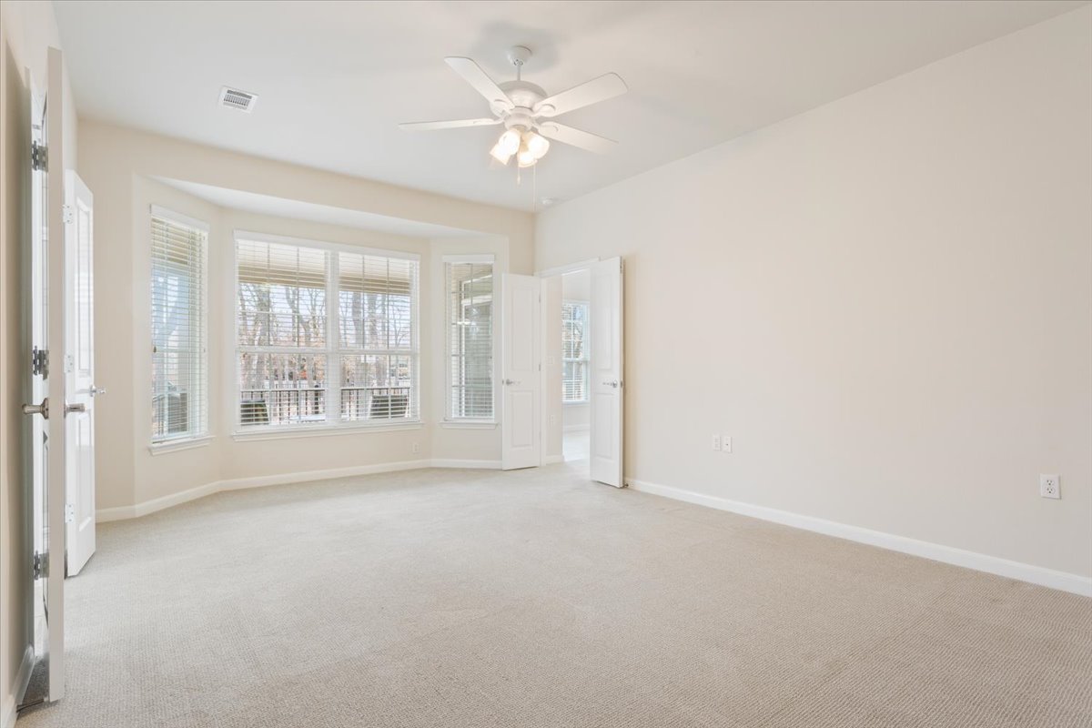 308 Monarch Trail Georgetown, TX 78633 - Photo 20 of 39 The primary bedroom has a large bay window and views of the greenspace.