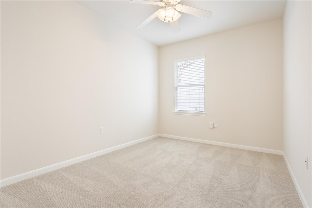 308 Monarch Trail Georgetown, TX 78633 - Photo 29 of 39 The second bedroom is light and bright.