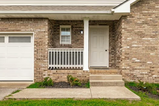 2029 Copper Kettle Circle Pleasant View, TN 37146 - Photo 5 of 58 a front view of a house with a yard