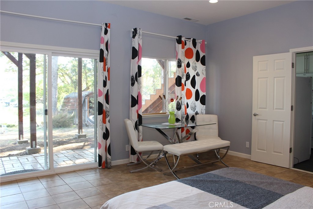 18702 East Ridge View Drive Hidden Valley Lake, CA 95467 - Photo 6 of 18 a living room with furniture and a rug