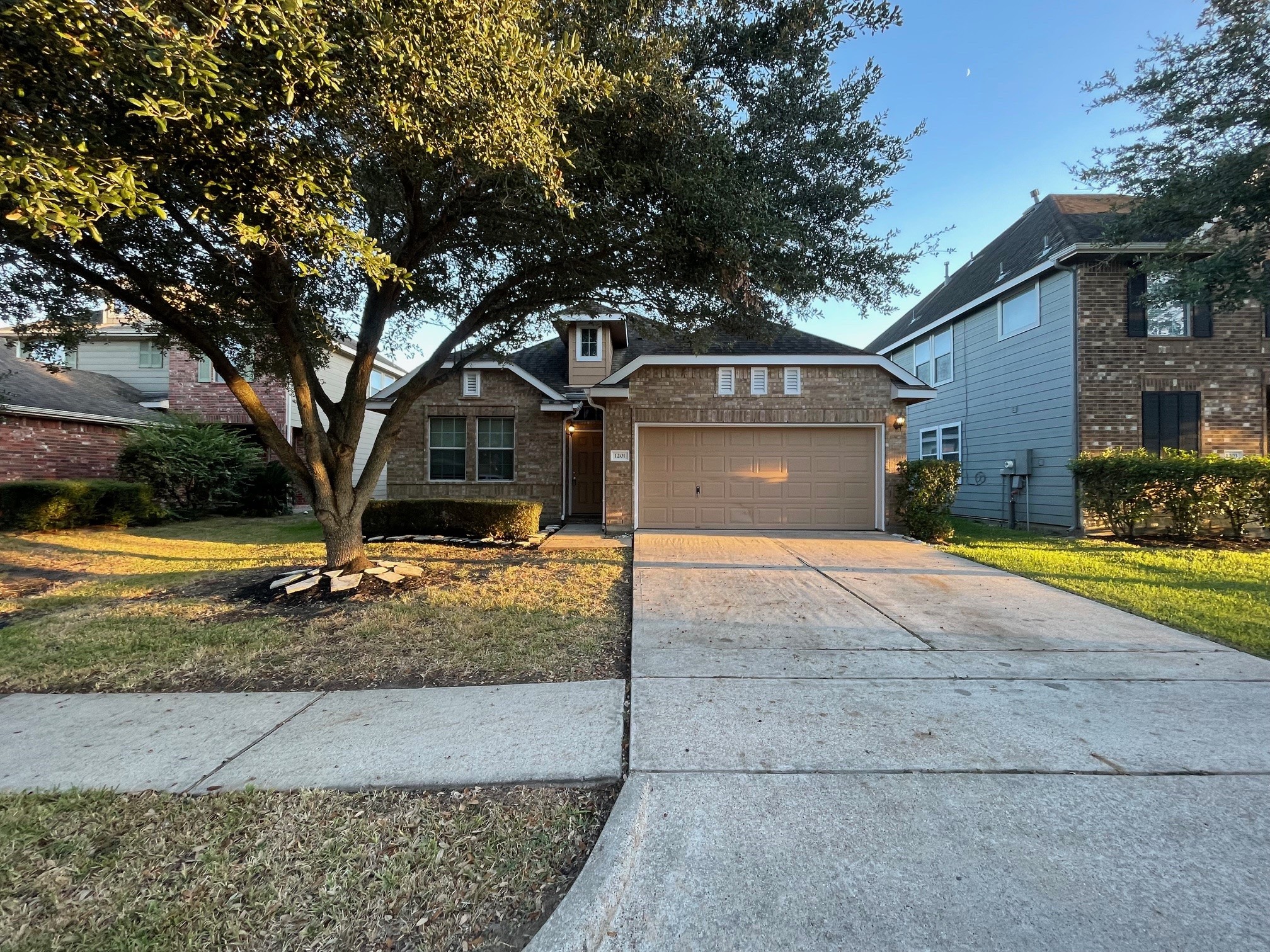 1201 Stallion Ridge Alvin, TX 77511 - Photo 1 of 29 a front view of a house with garage