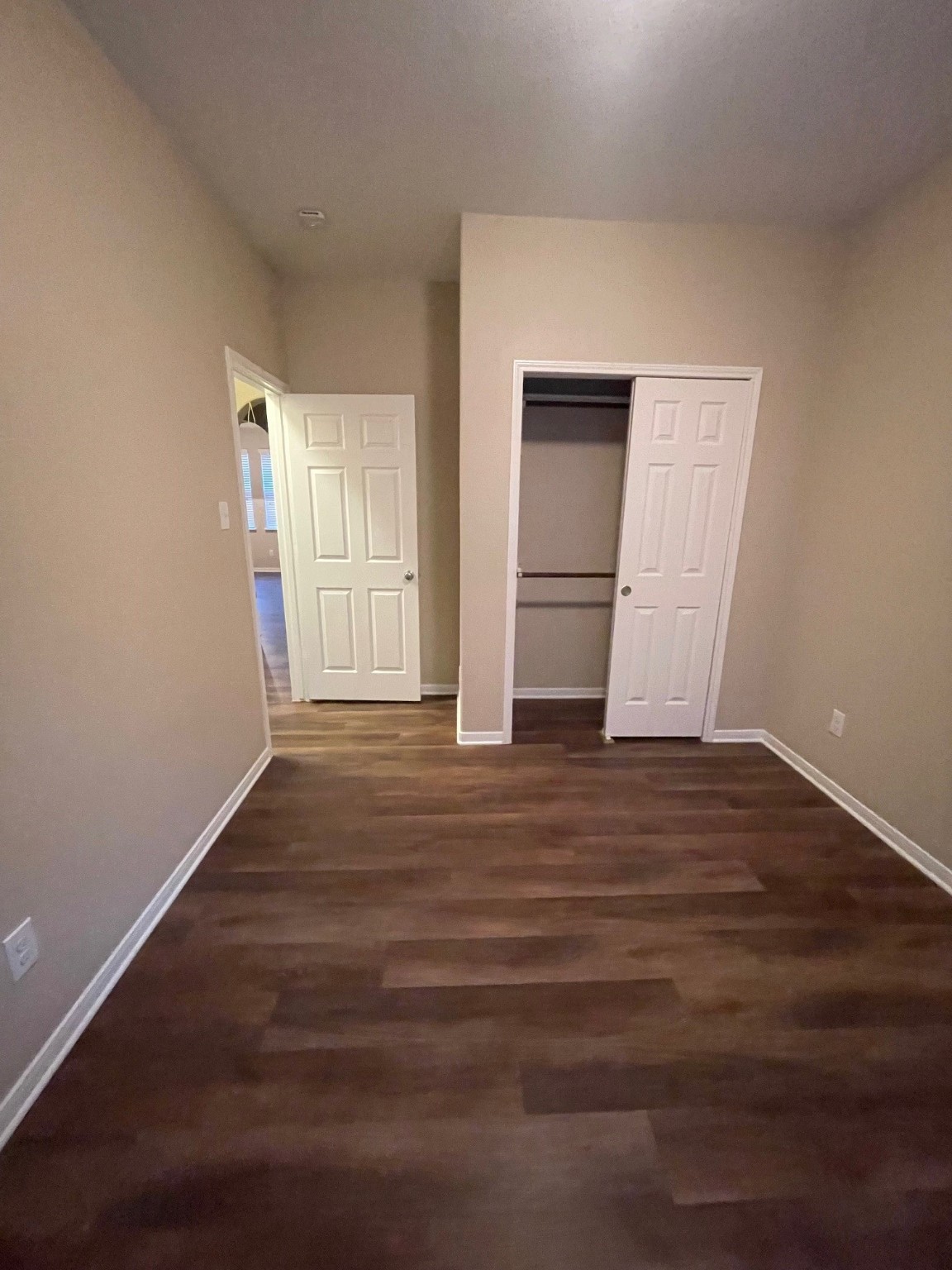 1201 Stallion Ridge Alvin, TX 77511 - Photo 11 of 29 a view of empty room with wooden floor and fan