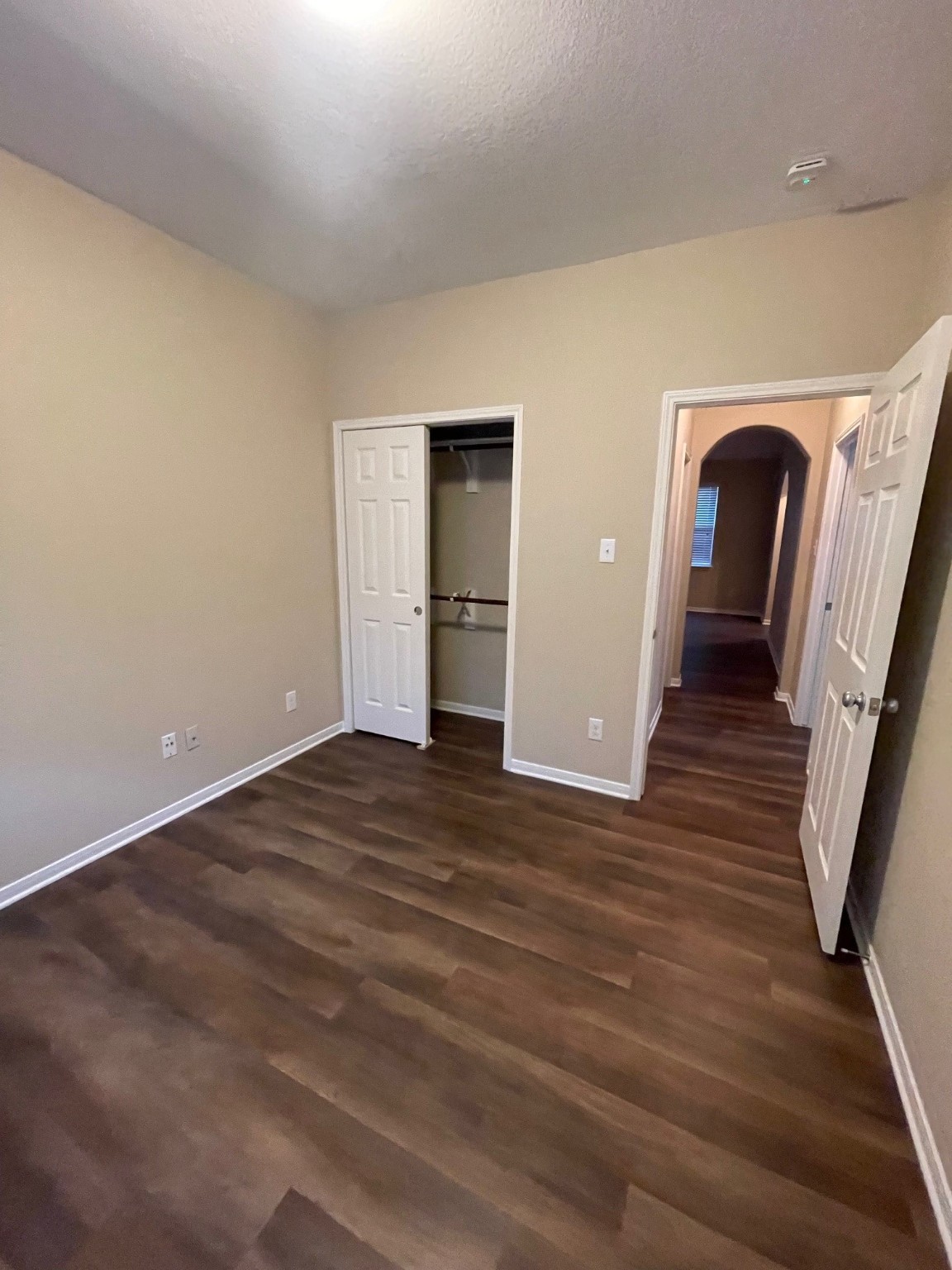1201 Stallion Ridge Alvin, TX 77511 - Photo 17 of 29 a view of a room with wooden floor and stairs