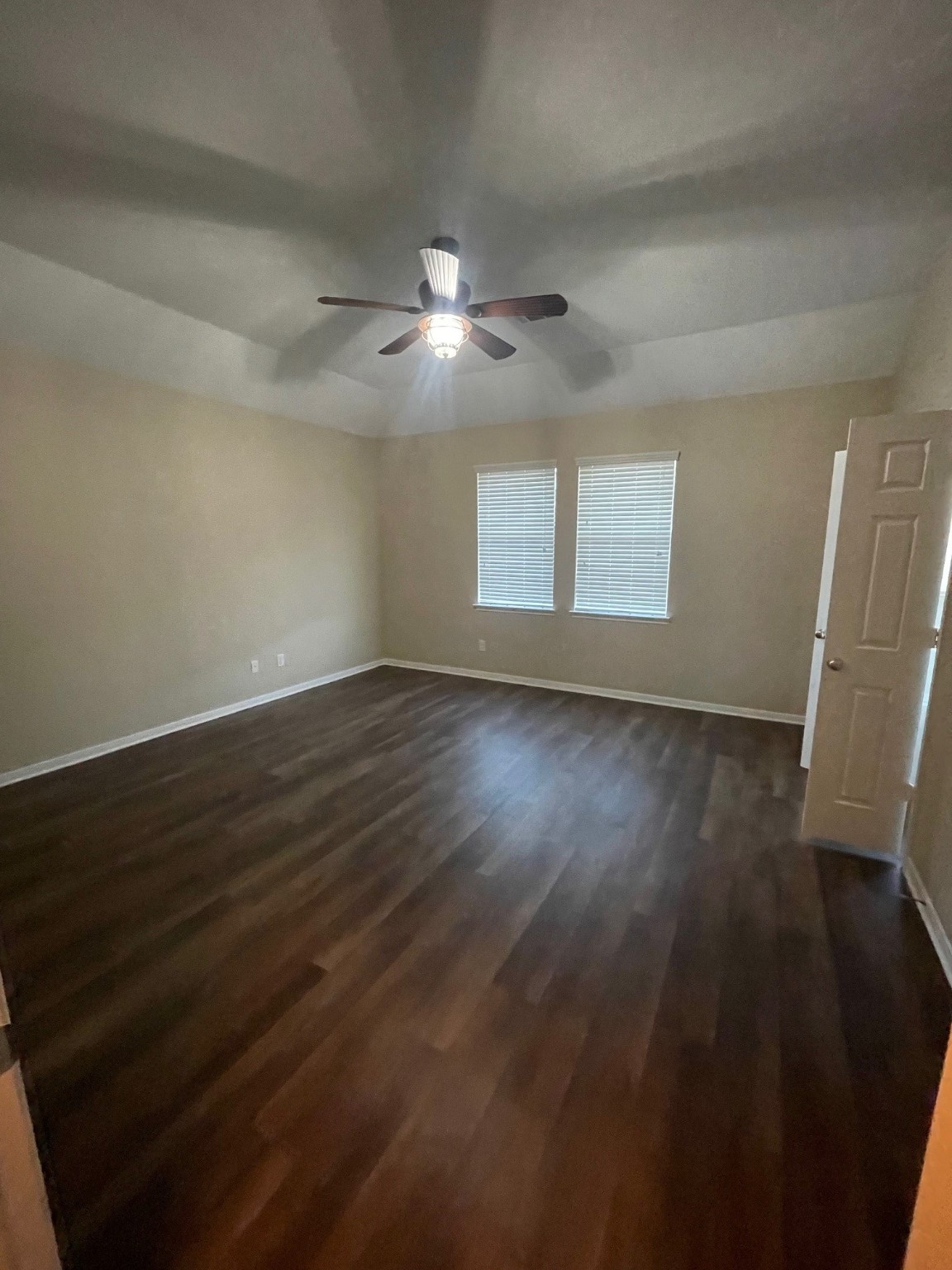 1201 Stallion Ridge Alvin, TX 77511 - Photo 18 of 29 an empty room with wooden floor and windows