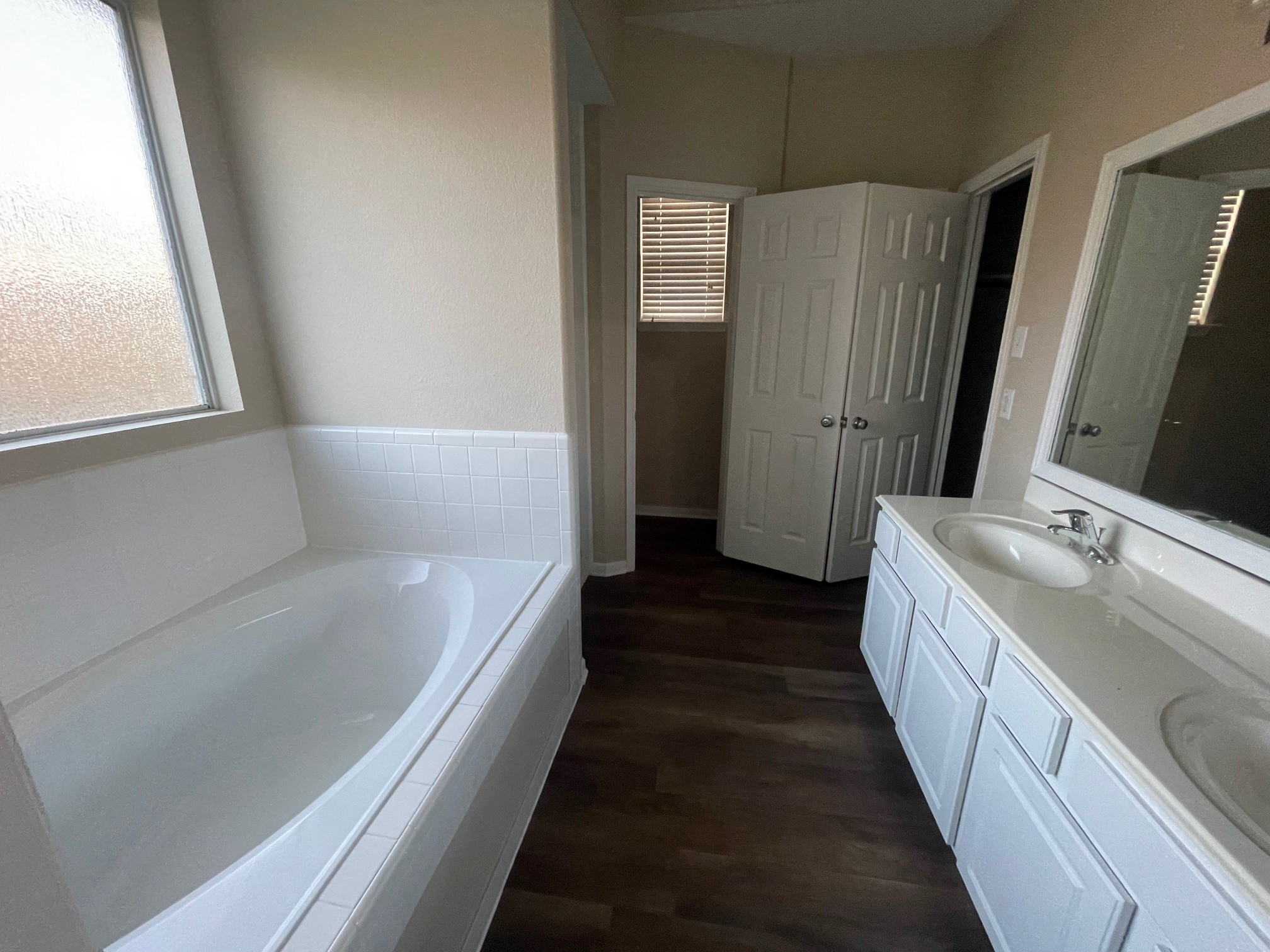 1201 Stallion Ridge Alvin, TX 77511 - Photo 20 of 29 a bathroom with a double vanity sink and mirror