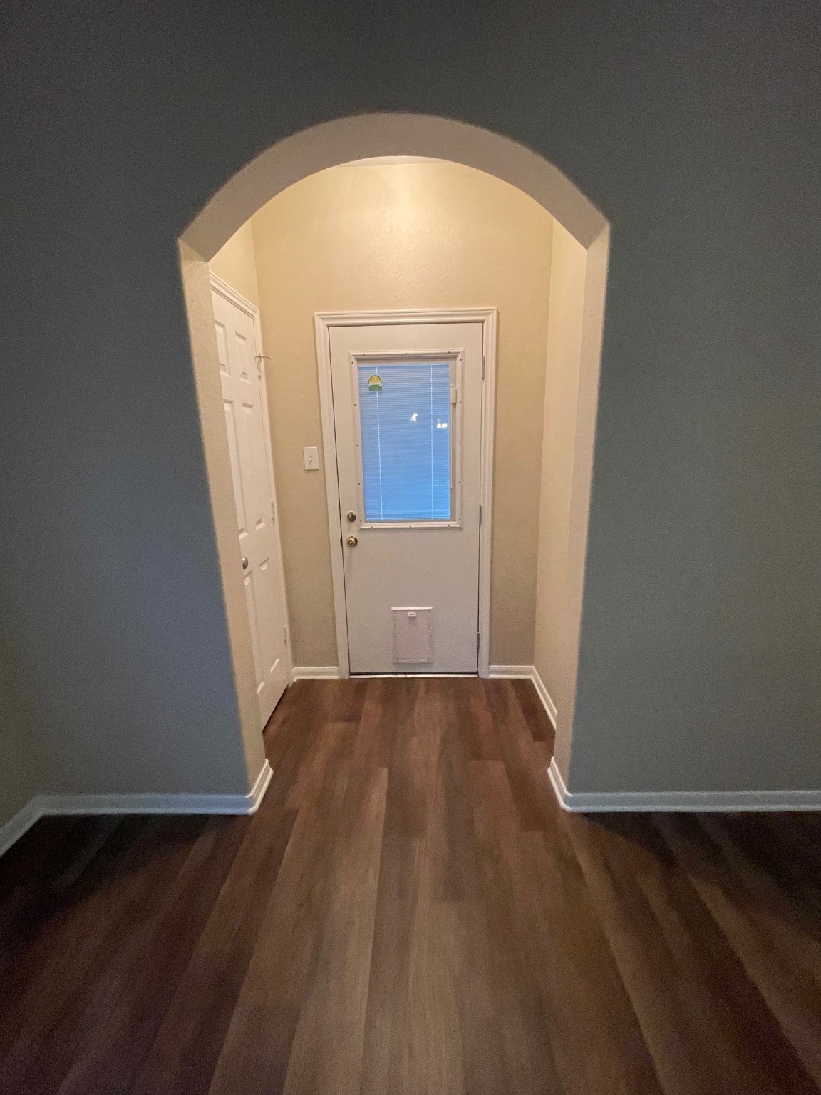 1201 Stallion Ridge Alvin, TX 77511 - Photo 23 of 29 a view of a hallway with wooden floor
