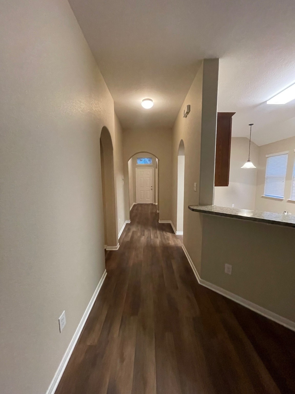 1201 Stallion Ridge Alvin, TX 77511 - Photo 28 of 29 a view of a hallway with wooden floor