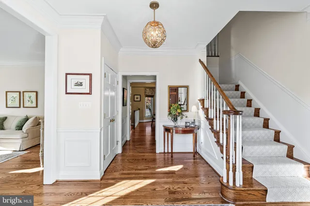 a bedroom with a bed and a dresser in it