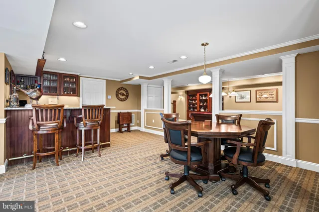 a view of dirt yard with large trees