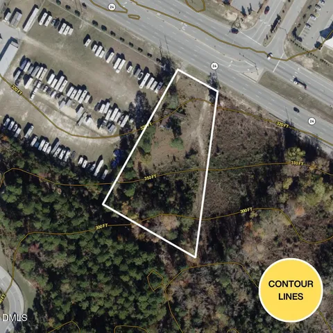 an aerial view of residential house and outdoor space