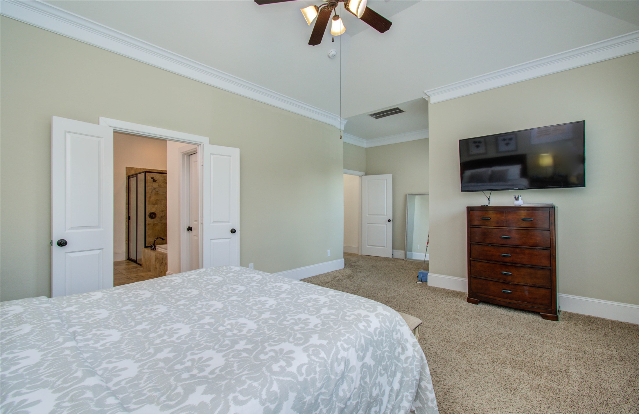 28627 Rolling Ridge Drive Katy, TX 77494 - Photo 23 of 44 a bedroom with a bed and a flat screen tv