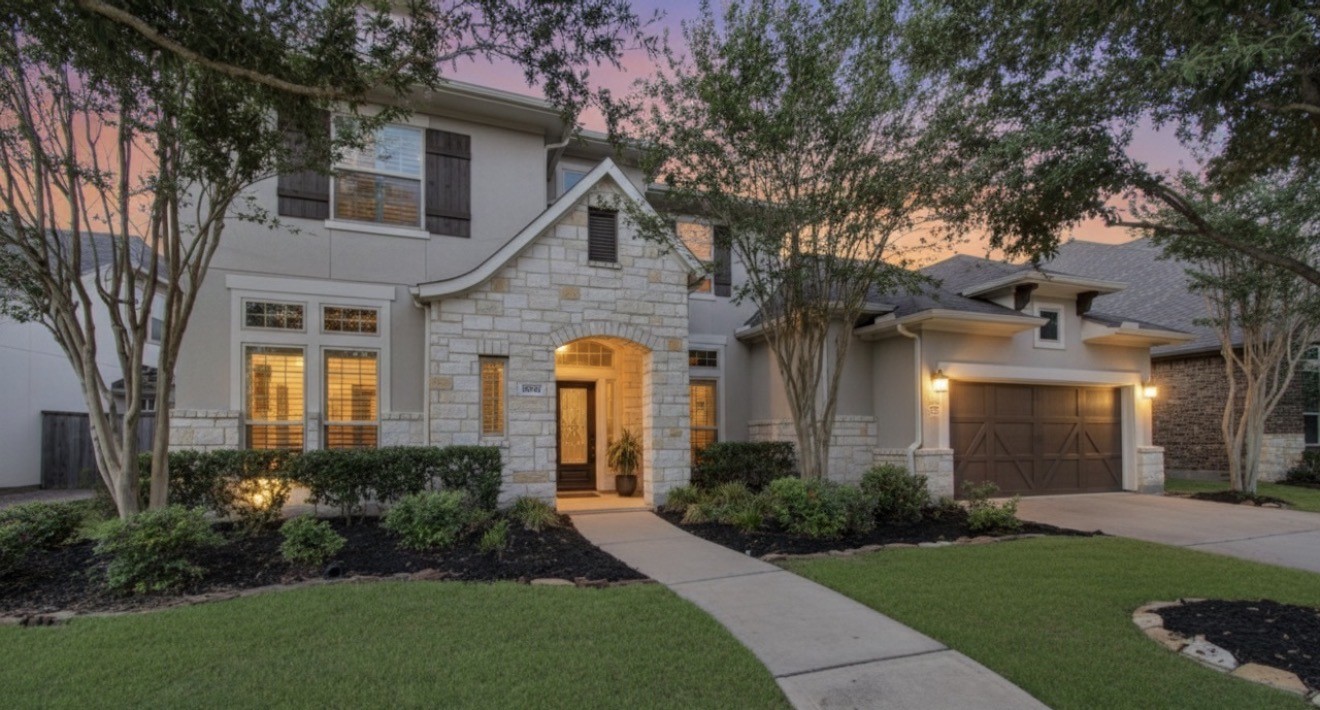 28627 Rolling Ridge Drive Katy, TX 77494 - Photo 3 of 44 a front view of a house with garden