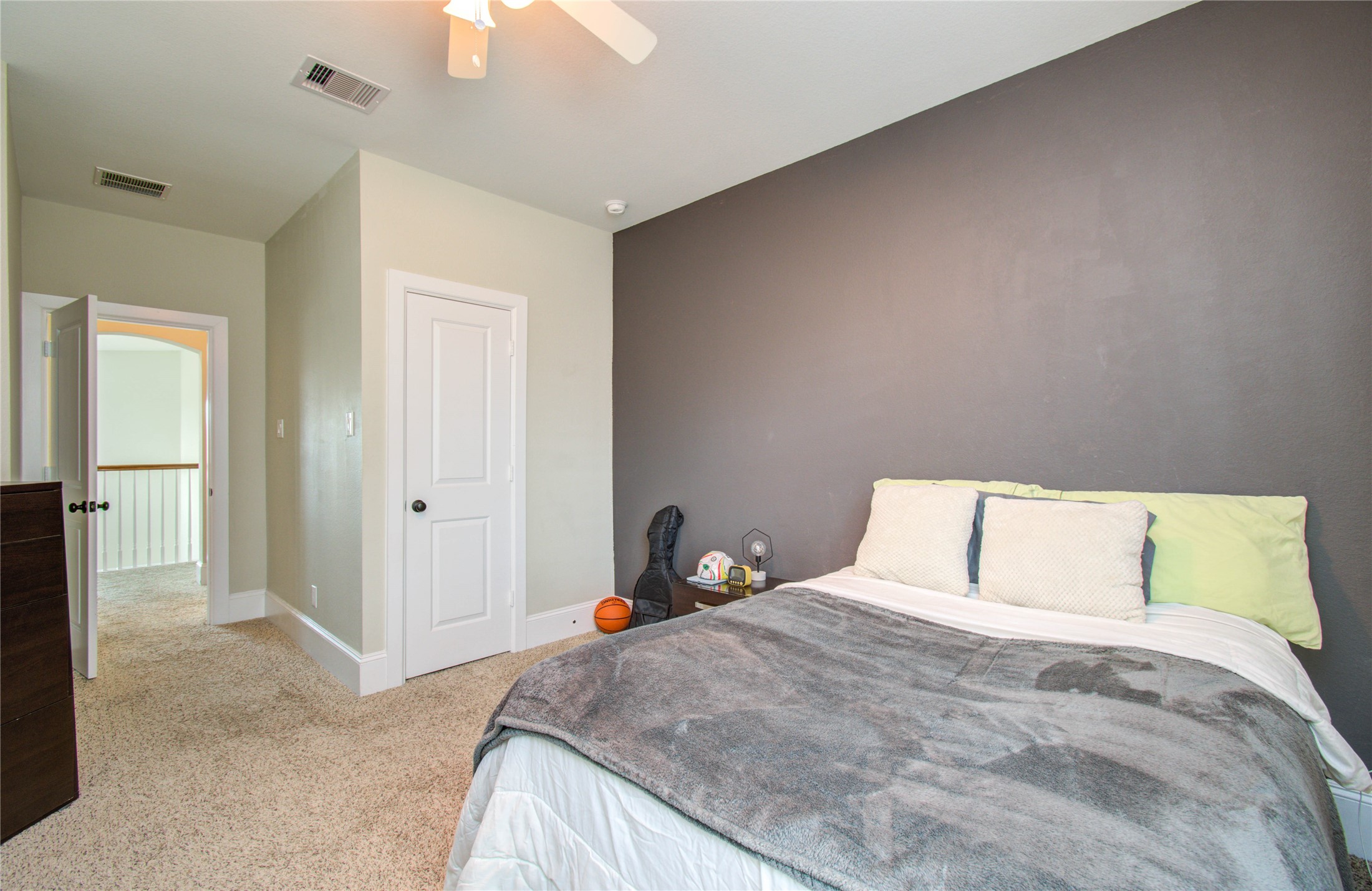 28627 Rolling Ridge Drive Katy, TX 77494 - Photo 35 of 44 a bedroom with a bed and a chandelier fan