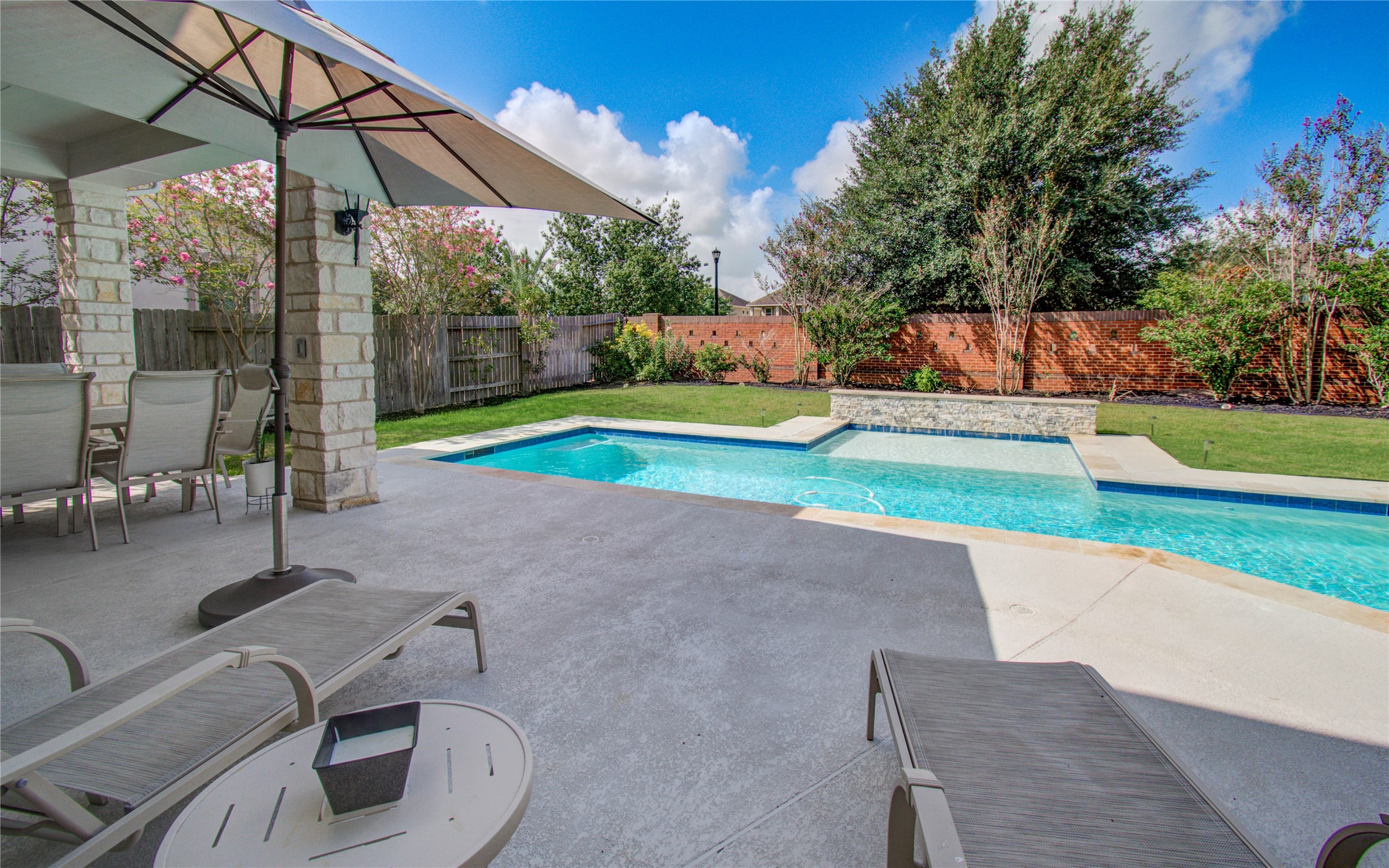 28627 Rolling Ridge Drive Katy, TX 77494 - Photo 40 of 44 a view of backyard with swimming pool and seating space