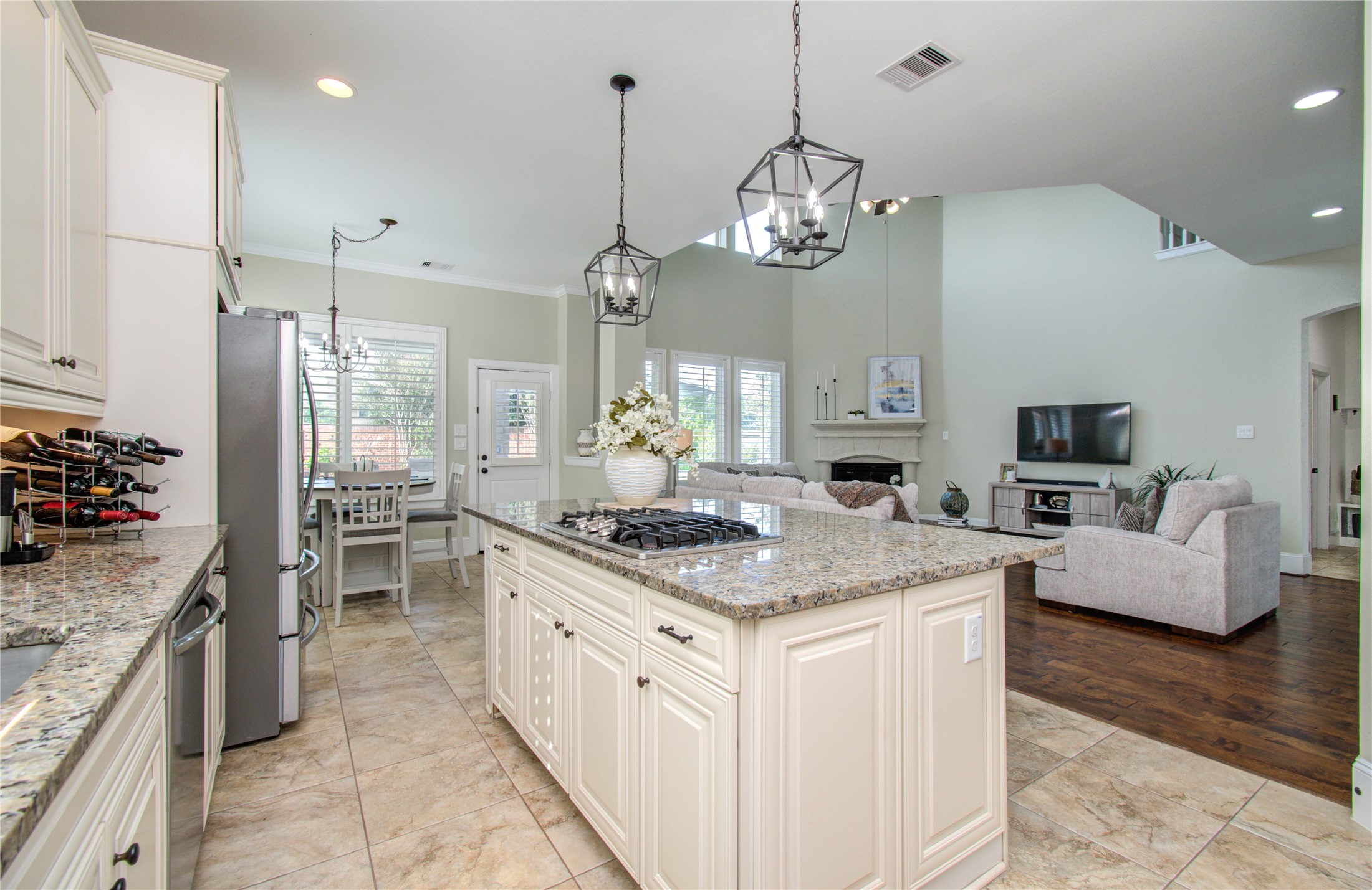 28627 Rolling Ridge Drive Katy, TX 77494 - Photo 5 of 44 a large kitchen with stainless steel appliances granite countertop a stove center island a stove and a center island
