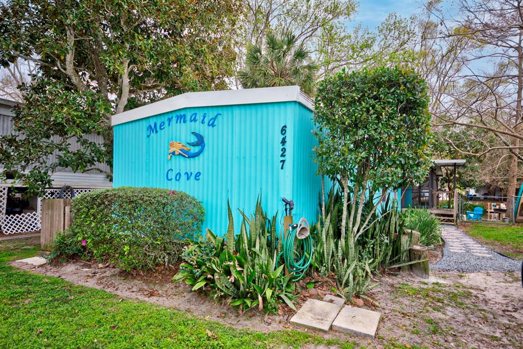 a sign that is on a wooden wall