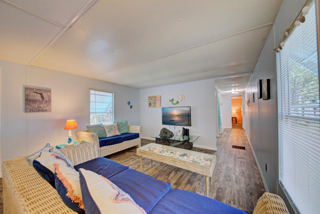 6427 West Richard Drive Weeki Wachee, FL 34607 - Photo 15 of 35 a living room with furniture and a wooden floor