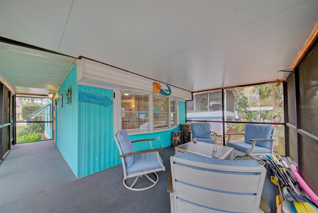 6427 West Richard Drive Weeki Wachee, FL 34607 - Photo 18 of 35 a room with furniture and a window