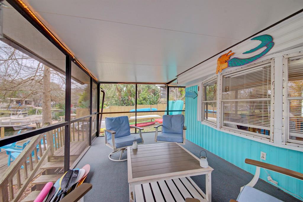 6427 West Richard Drive Weeki Wachee, FL 34607 - Photo 19 of 35 workspace with wooden floor and windows