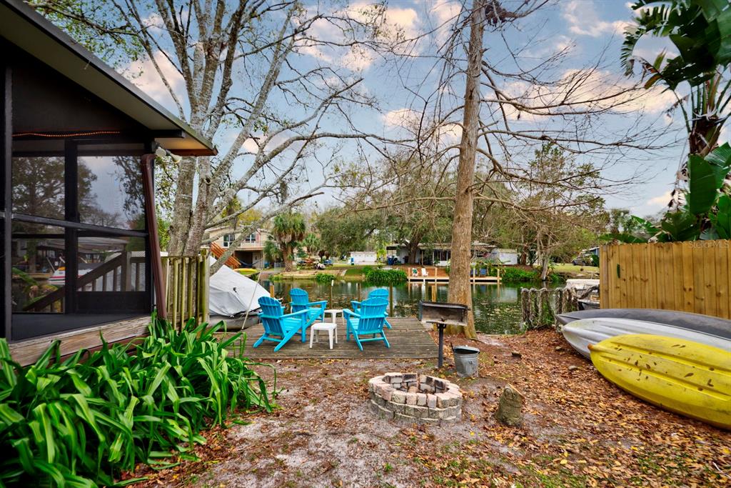6427 West Richard Drive Weeki Wachee, FL 34607 - Photo 22 of 35 a view of a swimming pool with a patio
