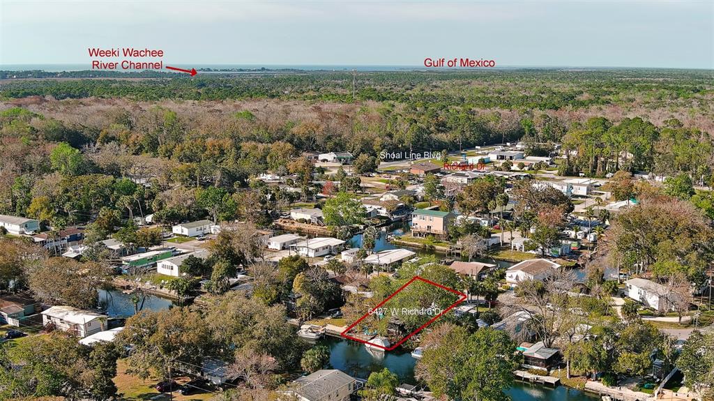 6427 West Richard Drive Weeki Wachee, FL 34607 - Photo 35 of 35 an aerial view of a city with lots of residential buildings